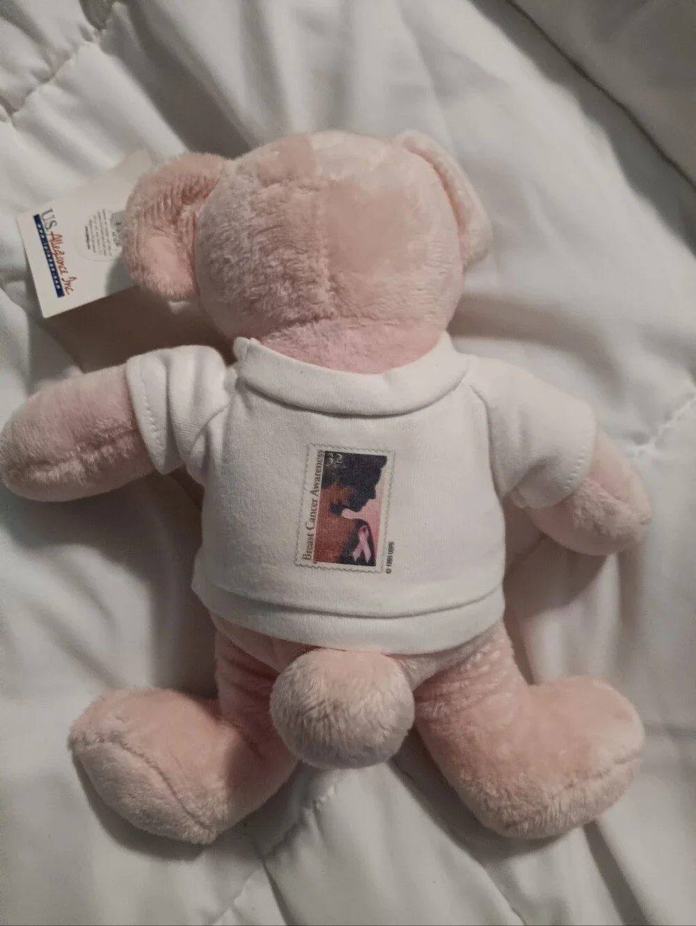 NWT USPS BREAST CANCER BEAR WITH POSTAGE STAMP ON BACK. WITH PINK JEWELS.